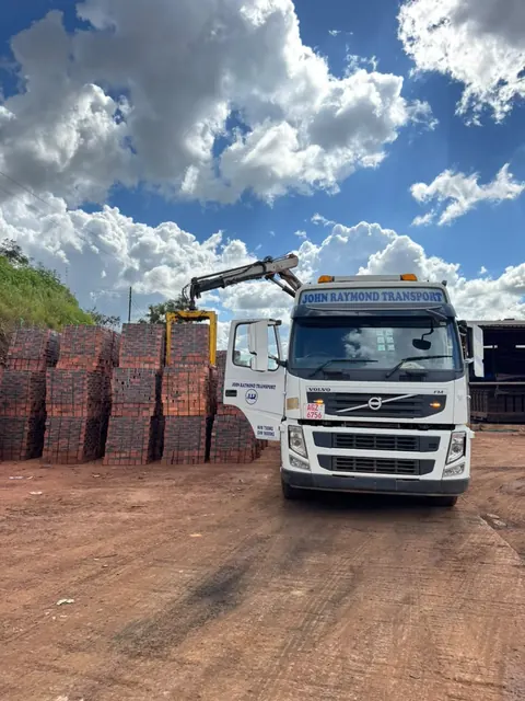 Bricks being loaded out of the yard at 33 Belvedere Road, Harare
